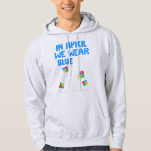 Grab this funny In April We Wear Blue Dinosaur Hol Hoodie