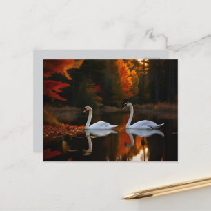 Graceful White Swans Gliding Across Autumn Pond Postcard