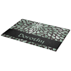 Gradient green petals on black cutting board