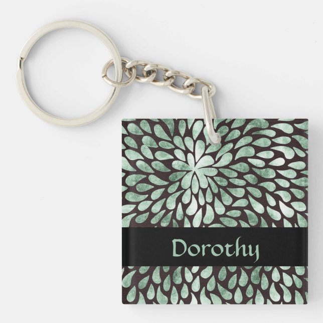 Gradient green petals on black key ring (Front)