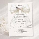Graduation party ivory bow cream class of 2026 invitation<br><div class="desc">Celebrate your achievement with this elegant ivory bow graduation invitation. The design features a large,  sophisticated satin ribbon adorned with delicate pearl strings and a subtle mortarboard icon. A cream colored background.  It is the perfect choice for high school or college seniors looking for a feminine and chic announcement.</div>
