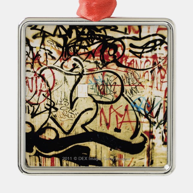 Graffiti on a wall metal tree decoration (Front)