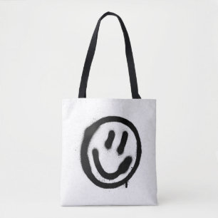 graffiti smiling face emoticon in black on whitesp tote bag