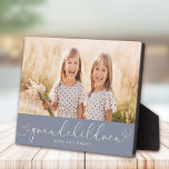 Grandchildren Modern Heart Script Photo Love Plaque<br><div class="desc">Celebrate the enduring bond between grandparent and grandchild with this exquisite photo plaque. This contemporary masterpiece features your chosen photograph nestled within a swirling heart,  crafted in elegant script. Personalised with your favourite photo of your cherished grandchildren,  it becomes a timeless treasure to grace any home.</div>