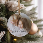 Grandkids Make Life Grand | Photo Ceramic Tree Decoration<br><div class="desc">Create a sweet gift for a beloved grandma or grandpa with this beautiful ceramic photo ornament. "Grandkids make life grand" appears as an overlay on your favorite photo in calligraphy lettering. Customize with the year and add a second photo to the back.</div>