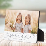 Grandma Modern Heart Script Photo Love  Plaque<br><div class="desc">Evoke warmth and tenderness with this personalised photo plaque,  a celebration of the unique bond between grandma and grandchild. This modern masterpiece features your chosen photograph embraced by a swirling heart,  crafted in elegant script. Personalised with your kids name,  it becomes a timeless treasure to adorn any home.</div>