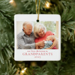 Grandparents First Christmas New Baby Photo Ceramic Ornament<br><div class="desc">This simple photo ornament features simple text, a photo on the front and baby's name and birth stats on the back of the ornament. The word Grandparents can be changed to "grandpa & grandma" or any wording of your choice. This photo ornament will make the perfect keepsake to celebrate their...</div>