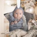 Grandparents First Christmas Photo White Ornament<br><div class="desc">Help them celebrate their first grandchild with this beautiful modern keepsake ornament. The white text reads "Our first Christmas as grandparents, " with the word "grandparents" in elegant handwriting script with flourishes before and after. Easily replace the sample image with your favourite photo of the new baby, and add his...</div>