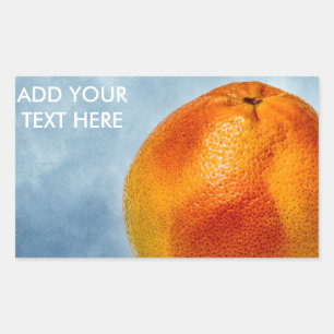 Grapefruit of bright orange colour rectangular sticker