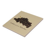 Grapes Kitchen Tile<br><div class="desc">A tile featuring an illustration of a bunch of dark purple grapes over a tan background.  Personalise with your name.</div>