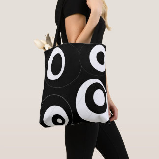 graphique rond noir et blanc tote bag