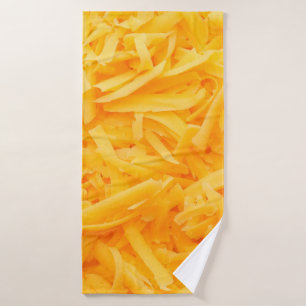 grated cheddar cheese top view bath towel