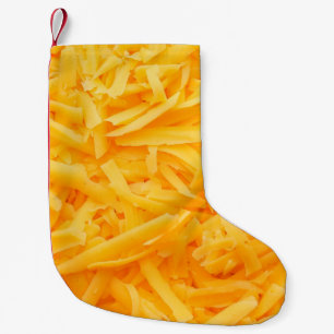 grated cheddar cheese top view small christmas stocking