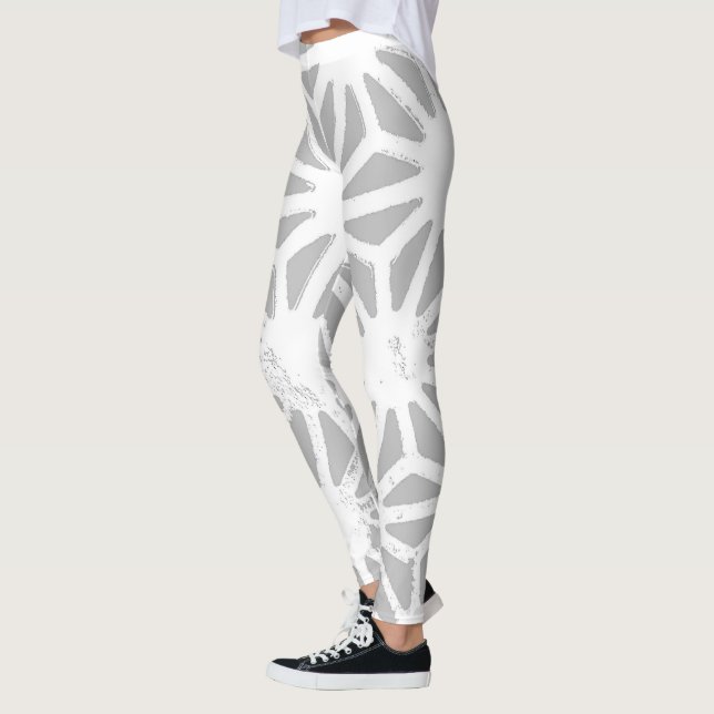 Gray and white geometric pattern leggings (Left)