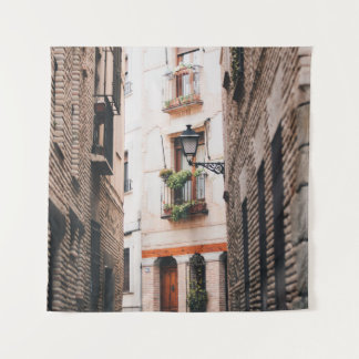 GRAY CONCRETE ALLEY DURING DAYTIME TAPESTRY