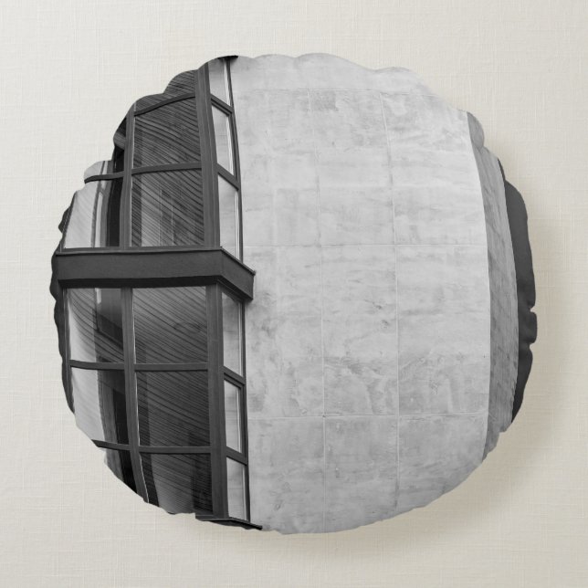 GRAY CONCRETE BUILDING WITH GLASS WINDOW ROUND CUSHION (Front)