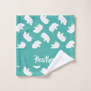 Gray hippo silhouette on teal wash cloth