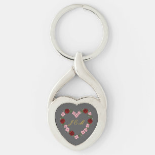 Gray metal keychain with rose and red heart