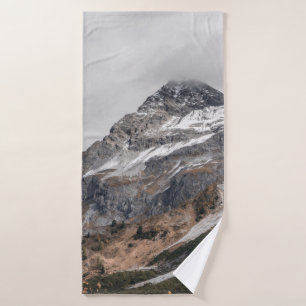 GRAY MOUNTAINS WITH SNOW CAPPED SURROUNDED WITH TR BATH TOWEL
