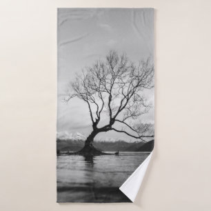 GRAYSCALE PHOTO OF BARE TREE ON CALM BODY OF WATER BATH TOWEL
