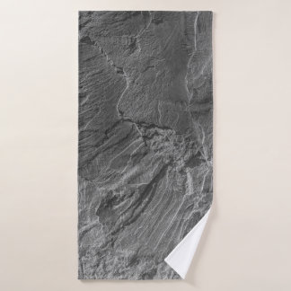 GRAYSCALE PHOTO OF ROCK FORMATION BATH TOWEL