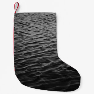 Grayscale photo of sea small christmas stocking