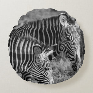 GRAYSCALE PHOTO OF ZEBRAS ROUND CUSHION