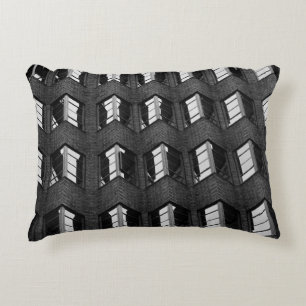 GRAYSCALE PHOTOGRAPHY OF CITY BUILDING DECORATIVE CUSHION