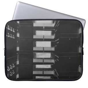 GRAYSCALE PHOTOGRAPHY OF NETWORK CABINETS LAPTOP SLEEVE