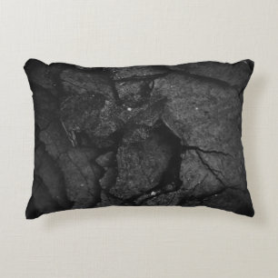 Grayscale photography of rock formation decorative cushion