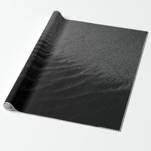 GRAYSCALE PHOTOGRAPHY OF SAND WRAPPING PAPER