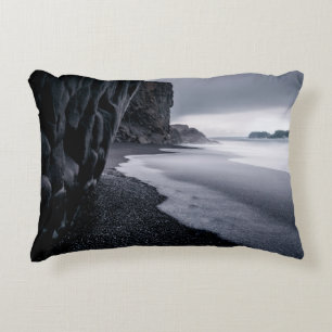 GRAYSCALE PHOTOGRAPHY OF SEASHORE AND CALM SEA DECORATIVE CUSHION