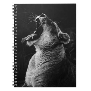 GRAYSCALE PHOTOGRAPHY OF YAWNING LIONESS NOTEBOOK