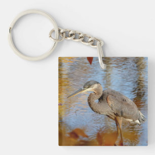 Great Blue Heron framed with fall foliage Key Ring