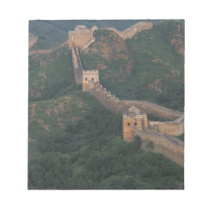 Great Wall winding through mountains. Notepad
