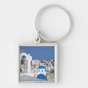 Greece, Santorini. Bell tower and blue domes of 2 Key Ring