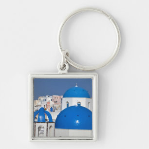 Greece, Santorini. Bell tower and blue domes of Key Ring