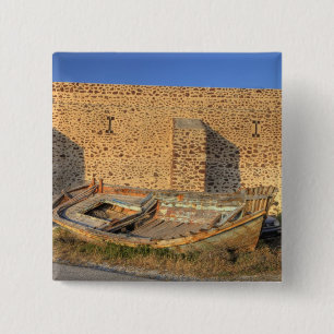 Greece, Santorini, Oia. Old fishing boat on dry 15 Cm Square Badge