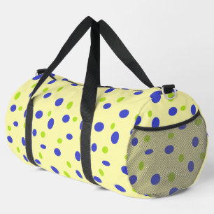 Green and blue dots on yellow duffle bag