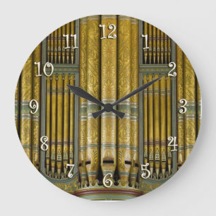 Green and gold  organ pipes round clock