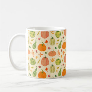 Green and orange pumpkins with leaves and branches coffee mug