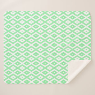 Green and white diamond pattern sherpa blanket
