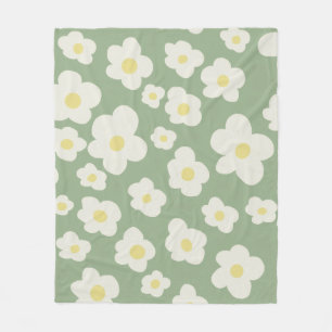 Green and white floral fleece blanket