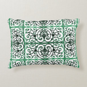 Green and white scrollwork pattern decorative cushion