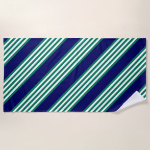 Green and white stripes pattern with navy blue beach towel