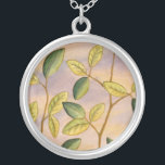 Green and Yellow Leaves on Sunset Background Silver Plated Necklace<br><div class="desc">The purple and gold of a sunset background is the perfect contrast to the yellow and green leaves that are the focus of this piece by Megan Meagher. You can almost hear the wind sing as it gently caresses the leaves.</div>
