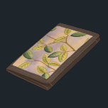 Green and Yellow Leaves on Sunset Background Trifold Wallet<br><div class="desc">The purple and gold of a sunset background is the perfect contrast to the yellow and green leaves that are the focus of this piece by Megan Meagher. You can almost hear the wind sing as it gently caresses the leaves.</div>