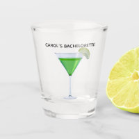 Green appletini cocktail with slice of apple