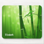 Green Bamboo With Pale Bokeh Lights In The Back Mouse Pad<br><div class="desc">A lush emerald green image of bamboo stalks with long delicate leaves and pale bokeh lights in the  background.</div>