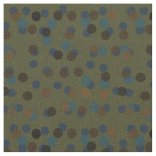 green, blue, brown, bronze, and black polka dot fabric